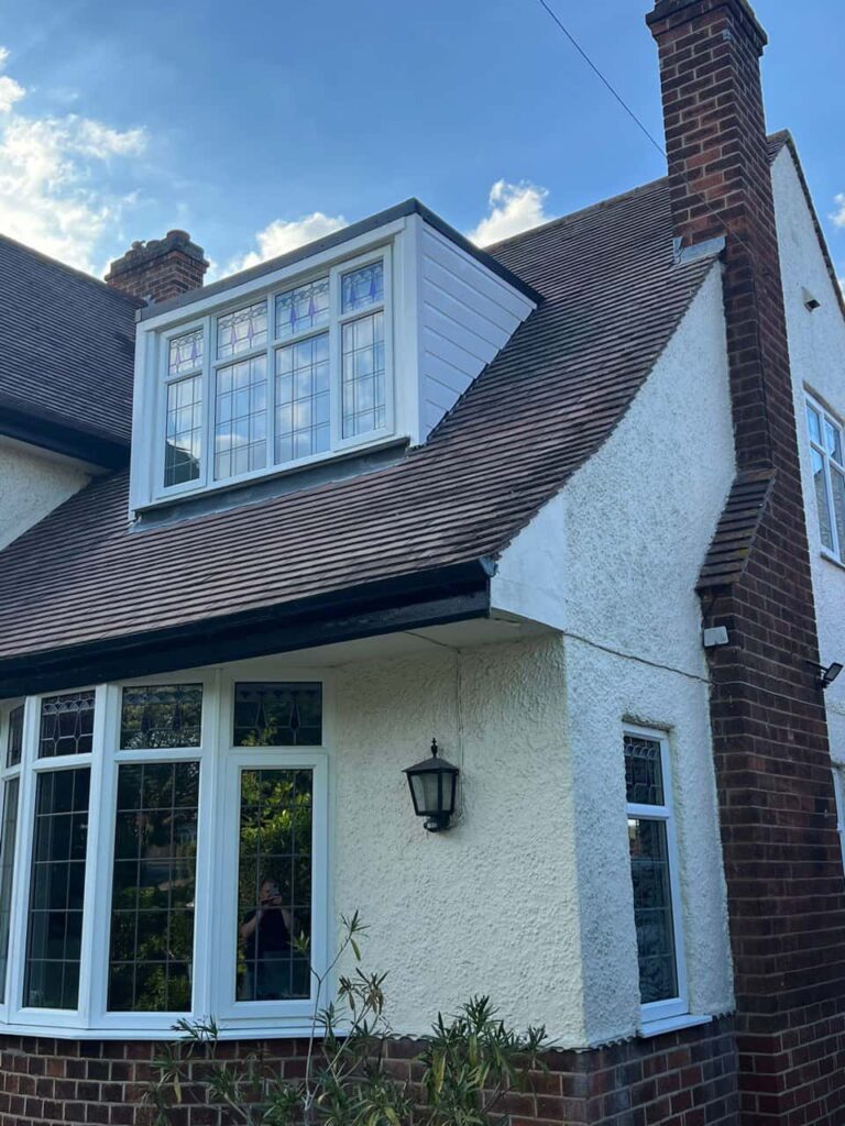 This is a photo of a dormer window which has just had some repairs carried out where the roof and the dormer meet. Works carried out by LJ Roofing Freshbrook